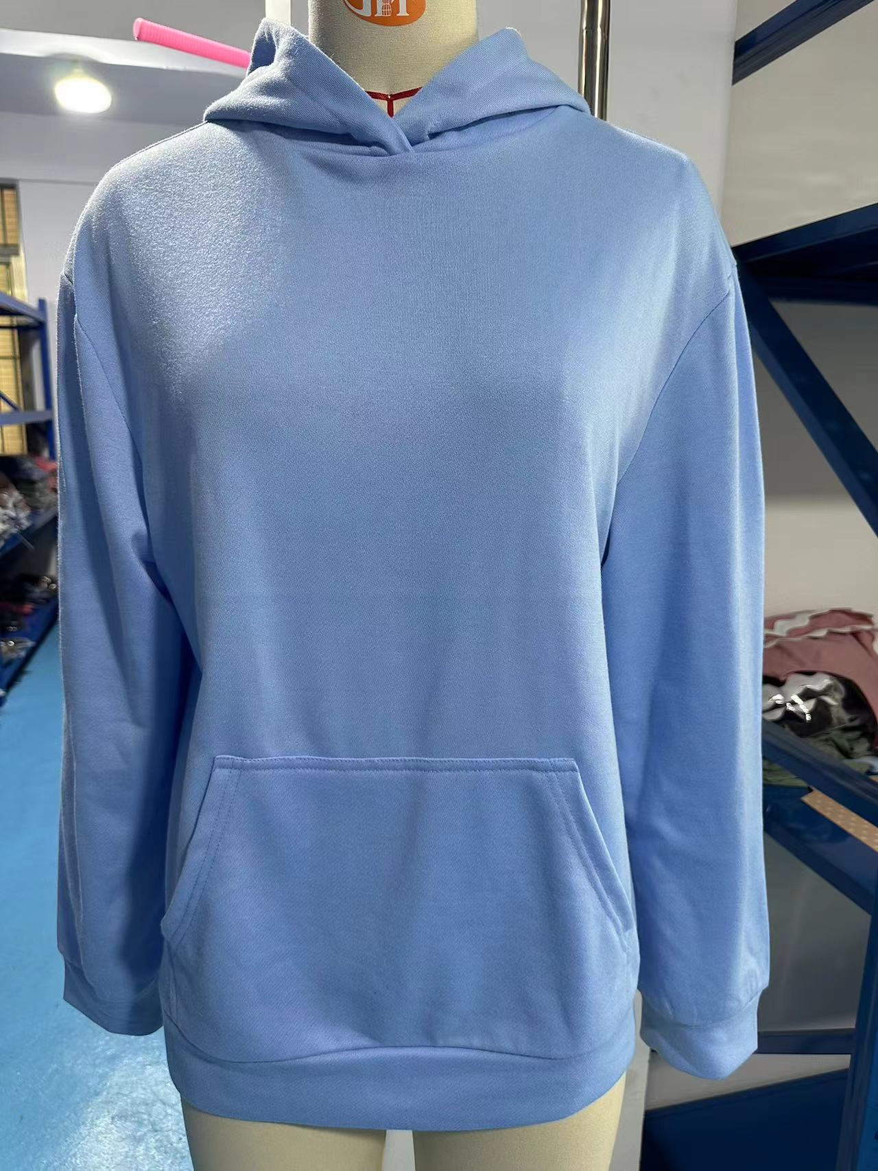 Autumn and Winter new casual hooded pocket sweatshirt solid color top for women 2025