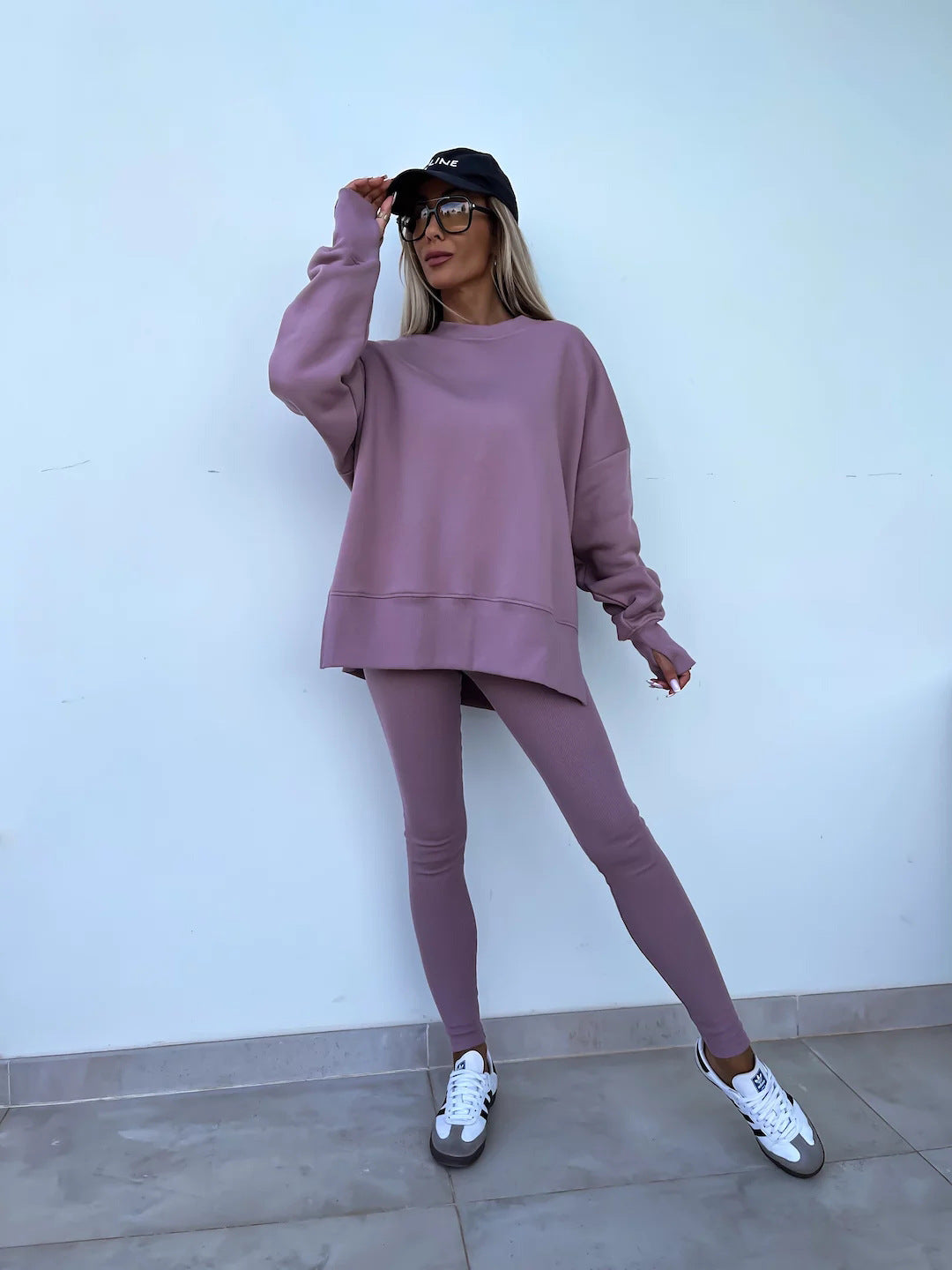 Spring sweater suit women's European and American casual loose long-sleeved round neck split top tight trousers
