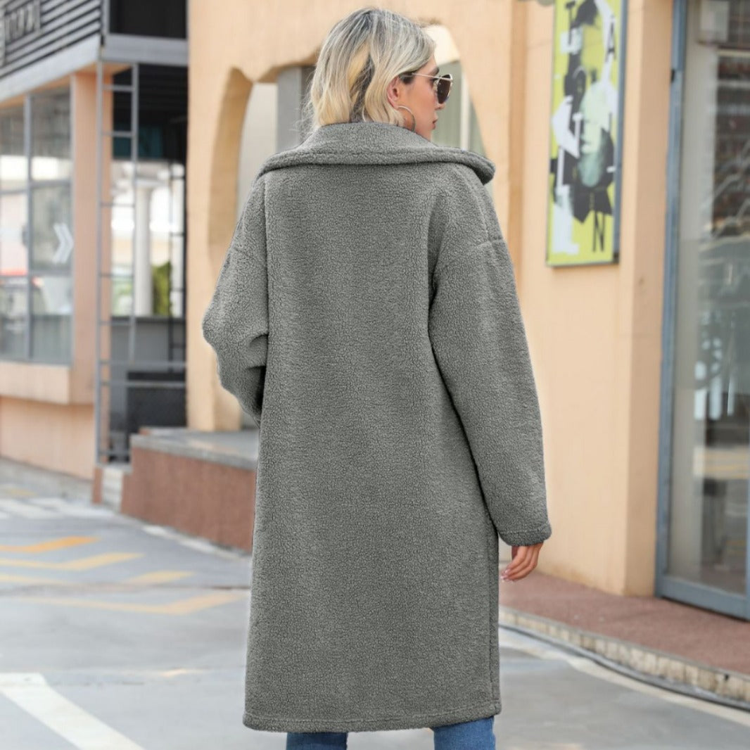 Autumn and winter women's long single-breasted lapel pocket solid color plush overcoat jacket